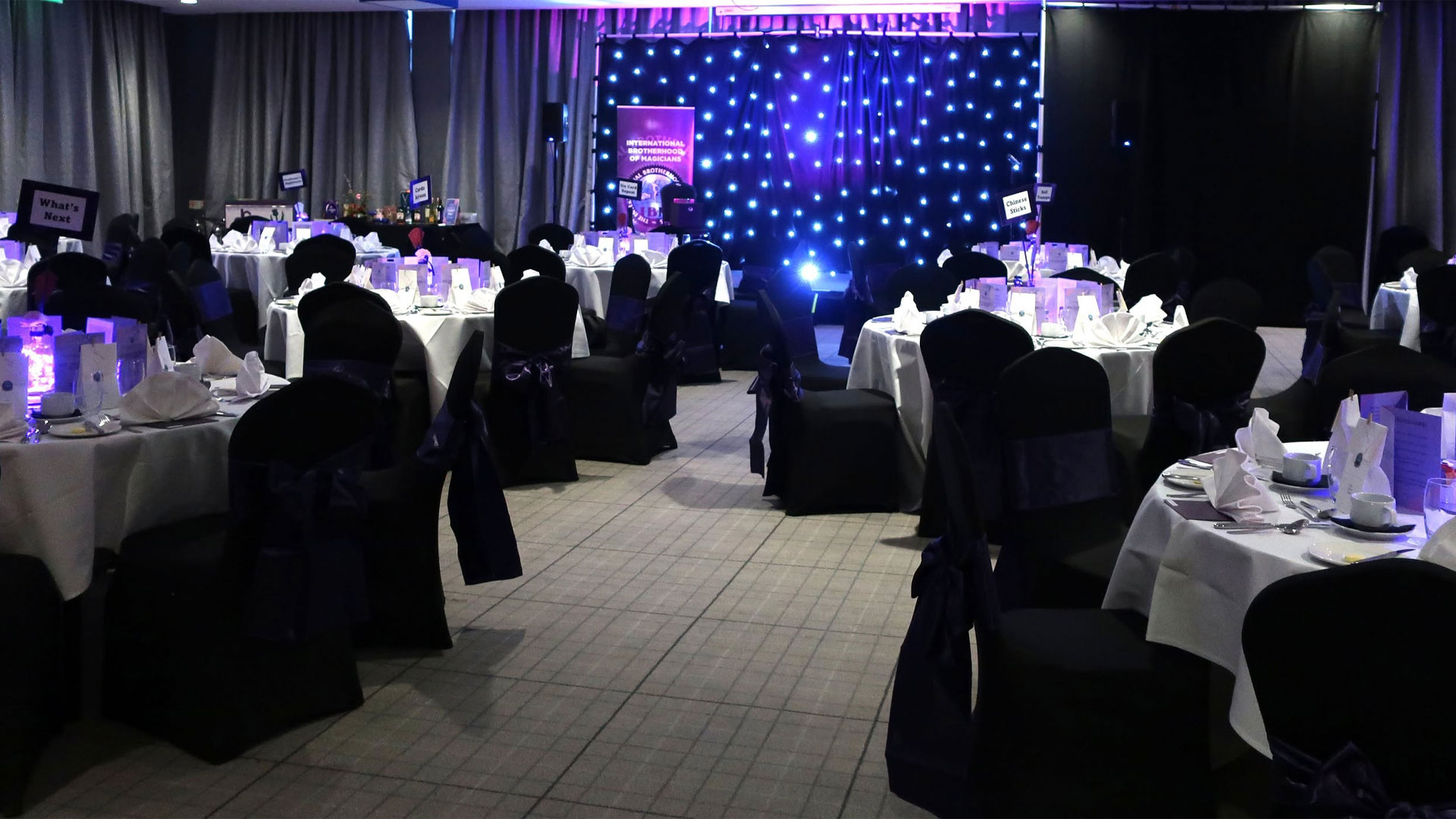 Black-tie dining room prepared for the IBM British Ring President's Annual Dinner
